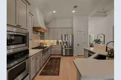 12516 Uvalde Creek Drive, Austin, TX 78732 - Photo 12