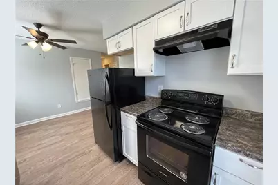 7417 Vintage Hills Drive #D, Austin, TX 78723 - Photo 10