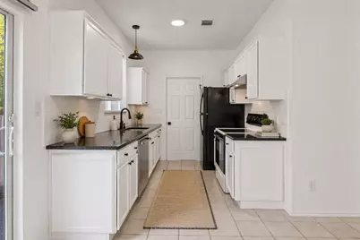 4501 Whispering Valley Drive #29, Austin, TX 78727 - Photo 6
