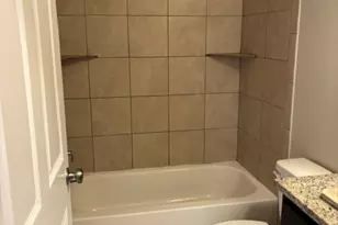 313 NW Carlos G Parker Blvd NW, Taylor, TX 76574 - Photo 4