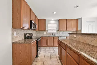 6913 Derby Downs Drive, Austin, TX 78747 - Photo 14