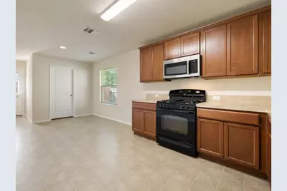 6908 Ferrystone Pass, Del Valle, TX 78617 - Photo 8