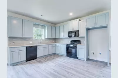 411 S Avenue B, Elgin, TX 78621 - Photo 1