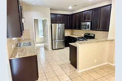 8633 White Ibis Drive, Austin, TX 78729 - Photo 6