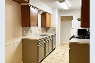 7000 Whispering Oaks Drive, Austin, TX 78745 - Photo 6