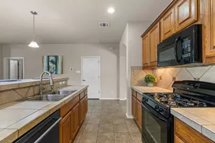 221 Blossom Vly Strm, Buda, TX 78610 - Photo 16