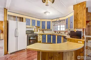 1215 Macintyre Ct, Dacono, CO 80514 - Photo 4