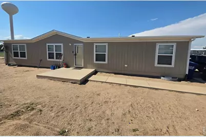 209 Larch Dr, Log Lane Village, CO 80705 - Photo 1
