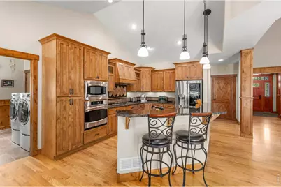 6854 Pumpkin Ridge Dr, Windsor, CO 80550 - Photo 14
