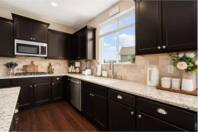 2163 Longfin Dr, Windsor, CO 80550 - Photo 6