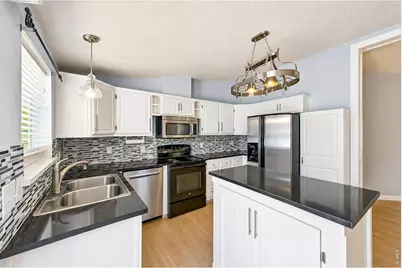7710 Hummingbird Grn, Frederick, CO 80530 - Photo 18
