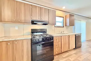 103 Beach Dr, Log Lane Village, CO 80705 - Photo 6