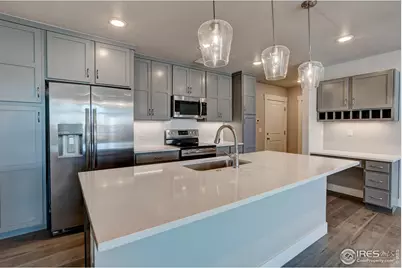 235 High Point Dr #E-103, Longmont, CO 80504 - Photo 1