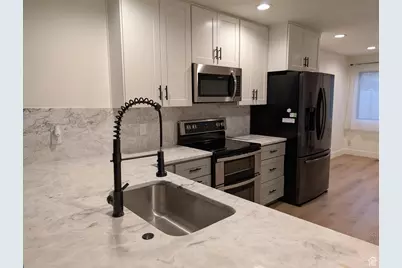 1575 E 6430 S, Salt Lake City, UT 84121 - Photo 2