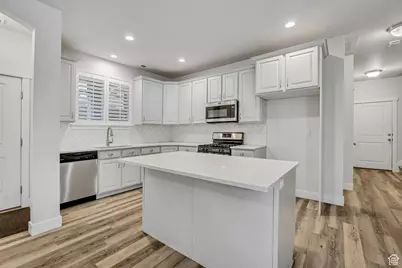 7116 W Adamo Dr S, West Valley, UT 84128 - Photo 6