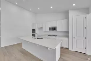 8674 N Halloran Ct, Lake Point, UT 84074 - Photo 4