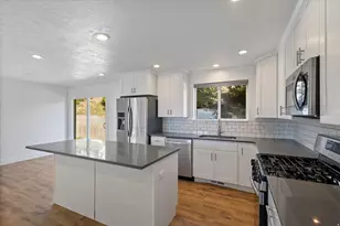 9977 S Lannae Dr E, Sandy, UT 84094 - Photo 8