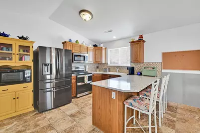 3139 N Pelican Dr, Farr West, UT 84404 - Photo 12