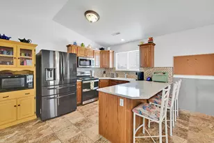 3139 N Pelican Dr, Farr West, UT 84404 - Photo 12