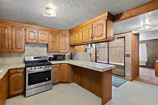 1675 W Warnock Ave, West Valley, UT 84119 - Photo 6