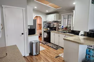 1142 W Barberry Dr S, Taylorsville, UT 84123 - Photo 2