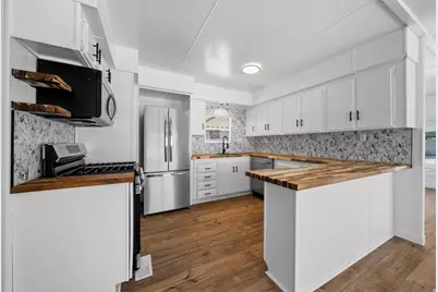 7107 S 1245 W, West Jordan, UT 84084 - Photo 1