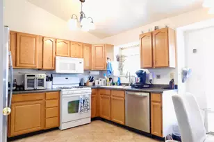 5707 S Esprit Dr W, Kearns, UT 84118 - Photo 10