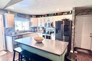 6935 W Dalmation St, West Valley, UT 84128 - Photo 18