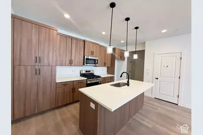 6960 W Hidden Hills Way #311, West Jordan, UT 84081 - Photo 2