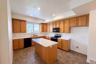 6943 W Bamburgh Way, West Valley, UT 84128 - Photo 2