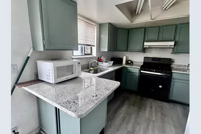 5767 W Dale Amour Dr, Kearns, UT 84118 - Photo 6