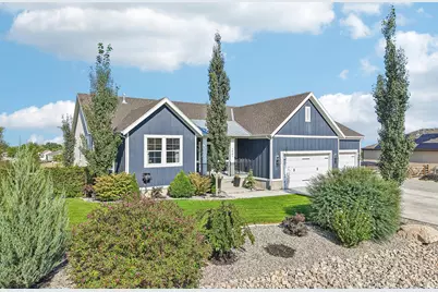 7901 N Cobblerock Rd E, Lake Point, UT 84074 - Photo 2