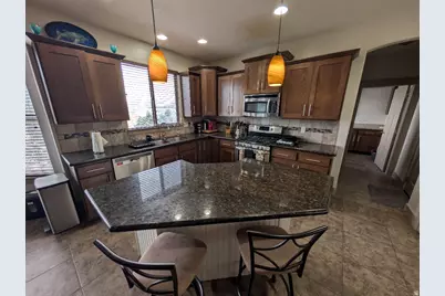 8775 S Millrace Cir, West Jordan, UT 84088 - Photo 6