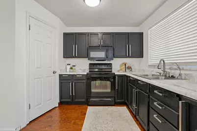 6504 S Fairwind Dr W, Taylorsville, UT 84129 - Photo 10