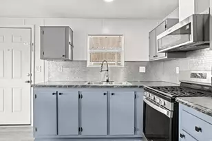 3579 S Byde A Wyle Dr, West Valley, UT 84119 - Photo 12