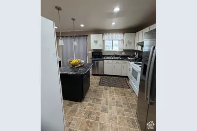 6130 W Powderwood Dr, West Valley, UT 84128 - Photo 6