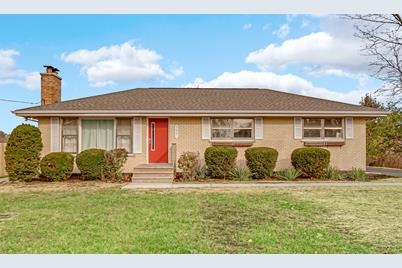 100 E Devon Avenue - Photo 1