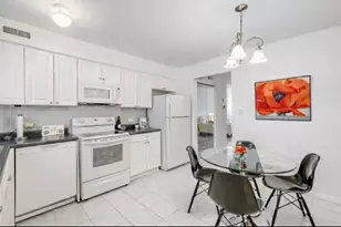 9387 Bay Colony Dr, Des Plaines, IL 60016 - Photo 1