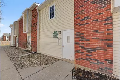 1203 Wyndham Court #105, Palatine, IL 60074 - Photo 1
