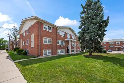 10121 Hartford Court #1B, Schiller Park, IL 60176 - Photo 1