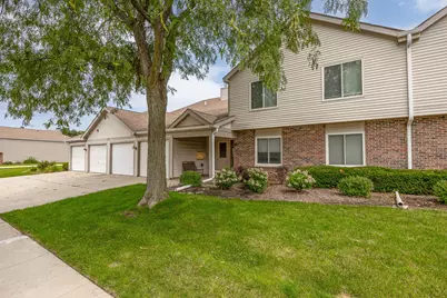 7050 Newport Drive #101, Woodridge, IL 60517 - Photo 1