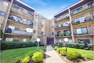 725 W Huntington Commons Road #416, Mount Prospect, IL 60056 - Photo 1