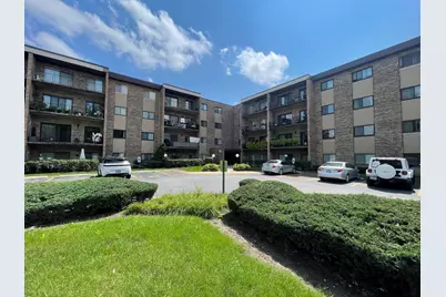 725 W Huntington Commons Road #416, Mount Prospect, IL 60056 - Photo 1