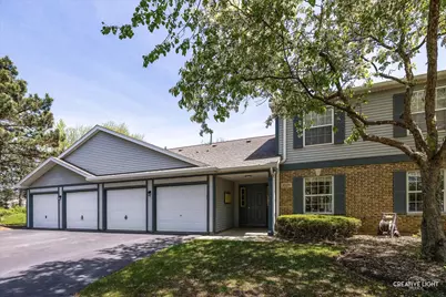 1025 Chaucer Court E #B, Elgin, IL 60120 - Photo 1