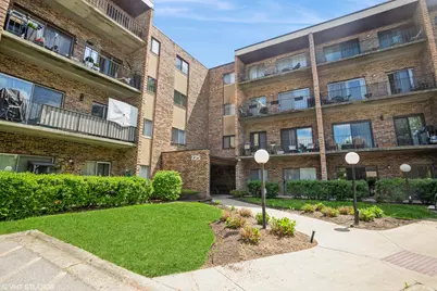 725 W Huntington Commons Road #407, Mount Prospect, IL 60056 - Photo 1