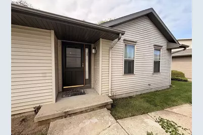 25 Plum Tree Village, Beloit, WI 53511 - Photo 1