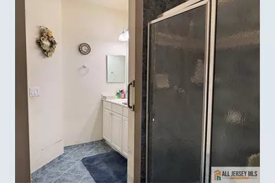 1113 Cedar Village Boulevard, East Brunswick Township, NJ 08816 - Photo 18