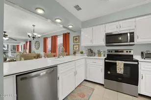 7813 N Lagoon Dr, Panama City Beach, FL 32408 - Photo 12