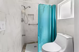 8231 S Lagoon Dr, Panama City, FL 32408 - Photo 24