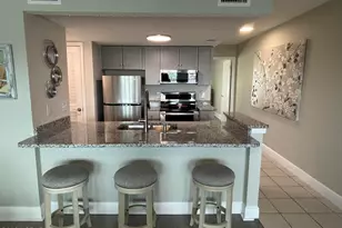 6909 N Lagoon Dr, Panama City Beach, FL 32408 - Photo 8